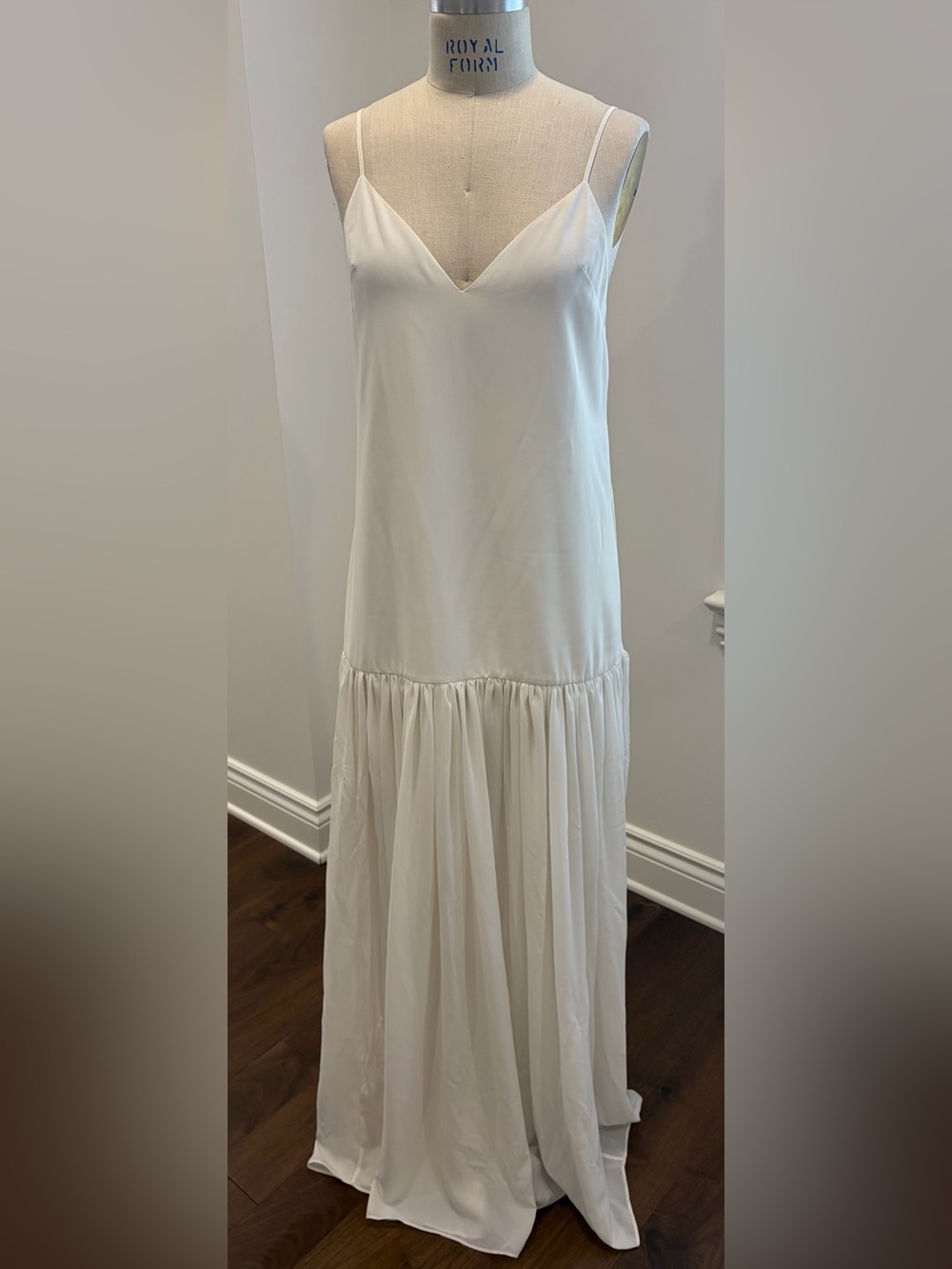 Minimal Cream Maxi Skirt with Gathered Hem Detail